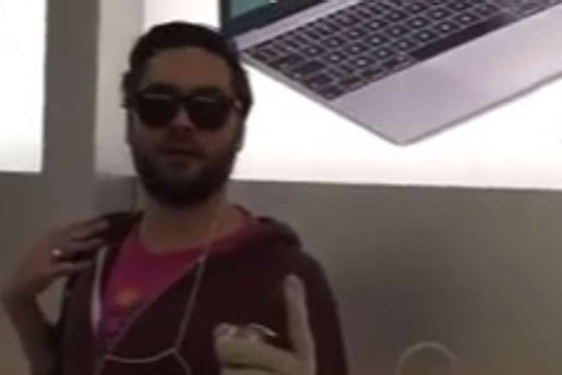 The scene, captured on camera and posted on the Internet, has gone viral in France. In it, the man walks into the store in a shopping mall in Dijon, central-eastern France, and pounds the screens of Apple products with a heavy fist-sized metal ball. Photo: YouTube