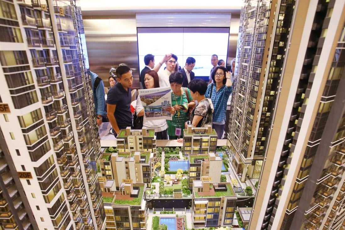 Potential buyers at the sales office of the One Kai Tak development. Photo: Dickson Lee