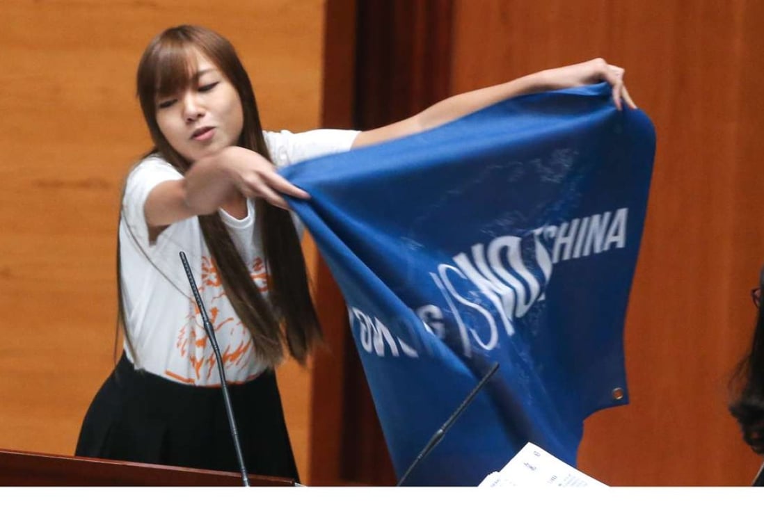 Youngspiration’s Yau Wai-ching makes a political point in the Legco chamber. Photo: Dickson Lee