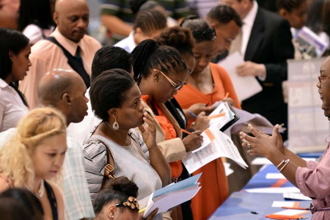A jobs fair at a community centre in New York. The US Labor Department’s latest non-farm payrolls rose by 156,000 last month, down from a gain of 167,000 in August. Photo: