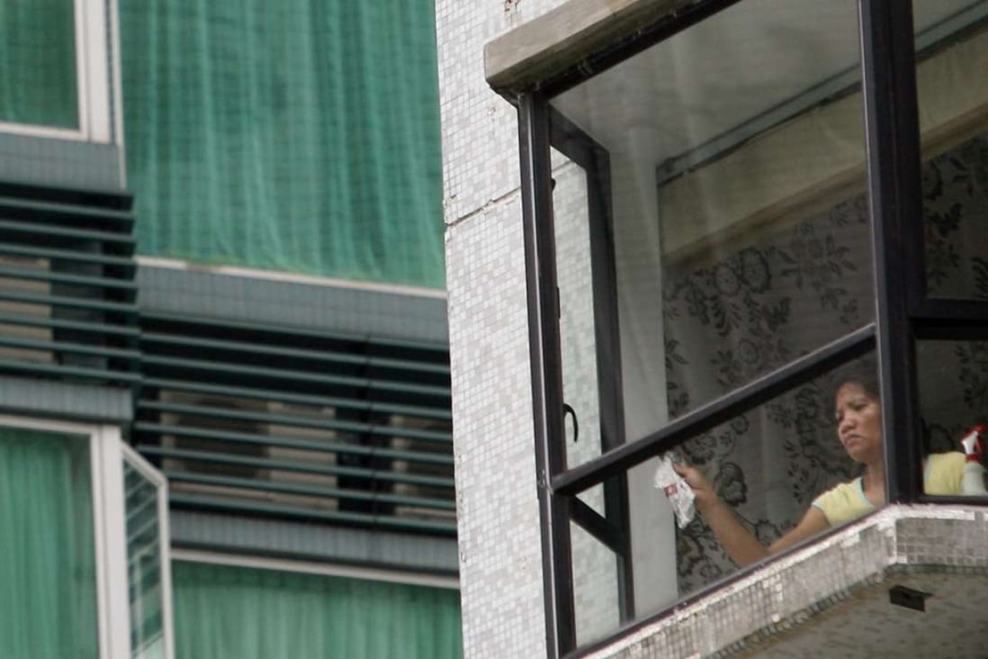 Fewer helpers will be cleaning the outsides of windows from now on. Photo: David Wong