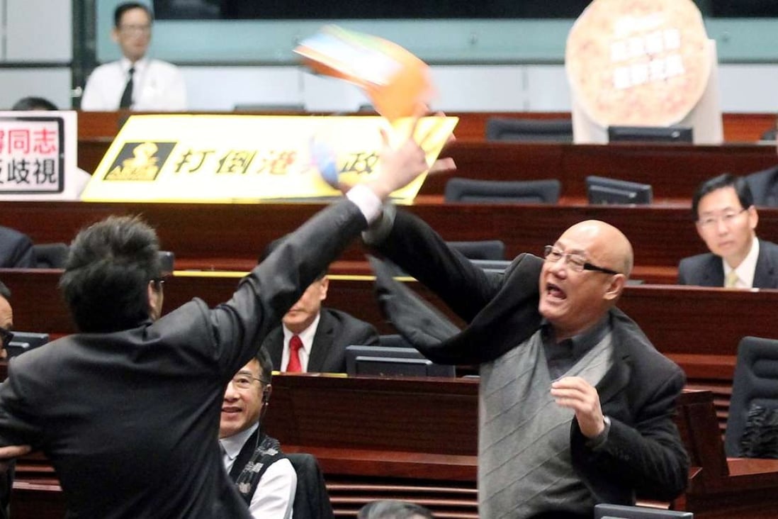 The frequent protests and throwing of objects in the Legco chamber have become one big yawn. Photo: Edward Wong