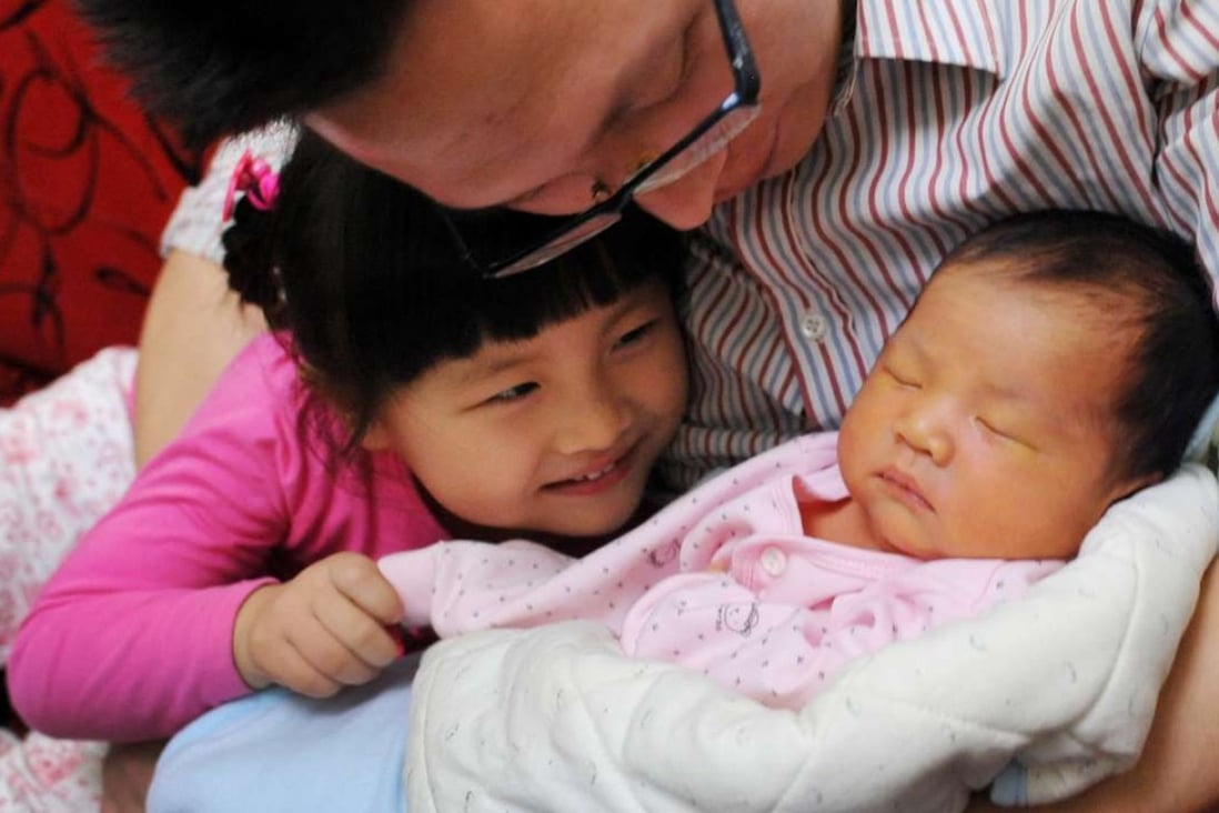 China is now keen for families to have a second child. Incentives include paid paternal leave of up to 30 days. Photo: Imaginechina