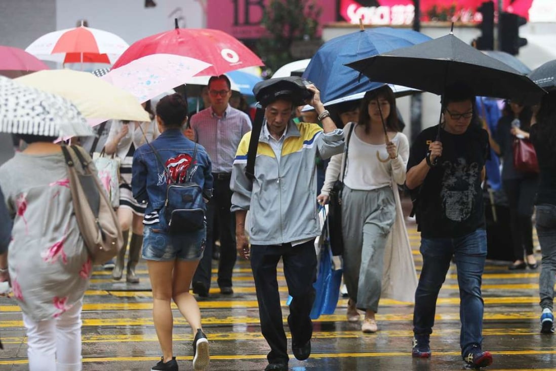 Hong Kong Observatory issues amber rainstorm warning alongside Strong ...
