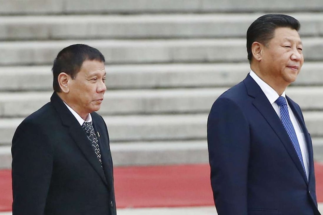 Philippine President Rodrigo Duterte (left) and his Chinese counterpart Xi Jinping attend a ceremony welcoming Duterte to China at Beijing's Great Hall of the People. Photo: Kyodo