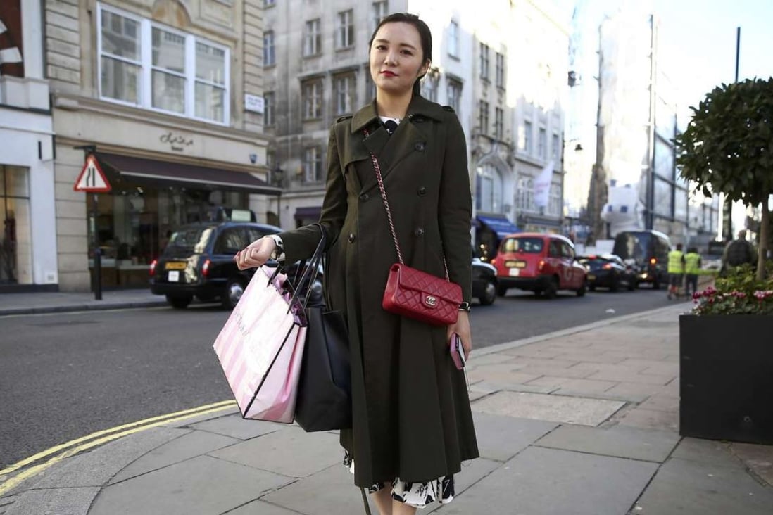 Chinese tourist Ines Chou on New Bond Street in London. Many Chinese visitors are drawn by the craftsmanship and authenticity of UK brands. Photo: Reuters