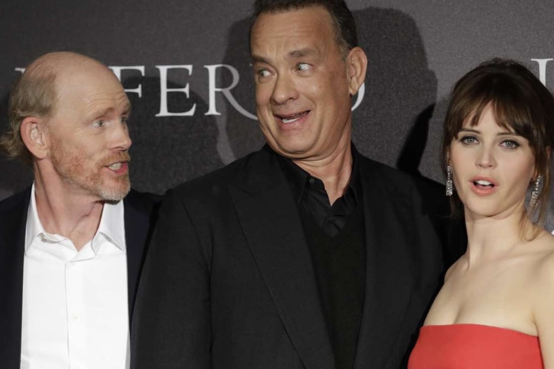 Director Ron Howard with Tom Hanks and Felicity Jones at the premiere of Inferno in Florence. Photo: AP