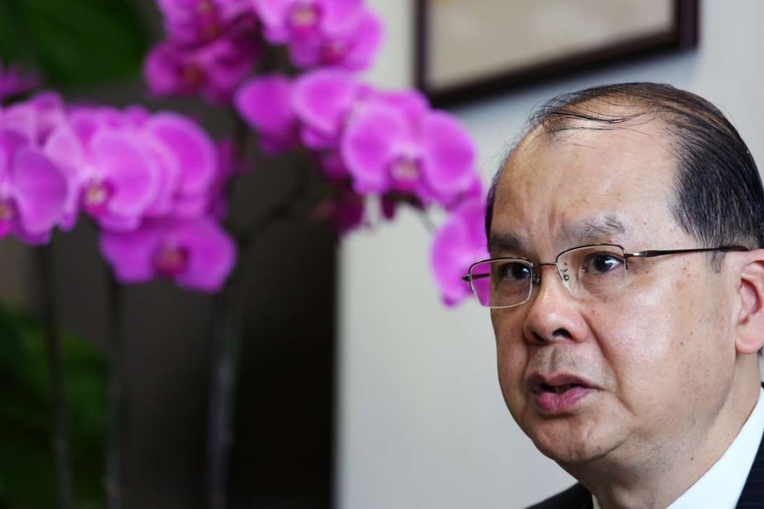 Labour minister Matthew Cheung clarifies the new rules on cleaning windows. Photo: Nora Tam