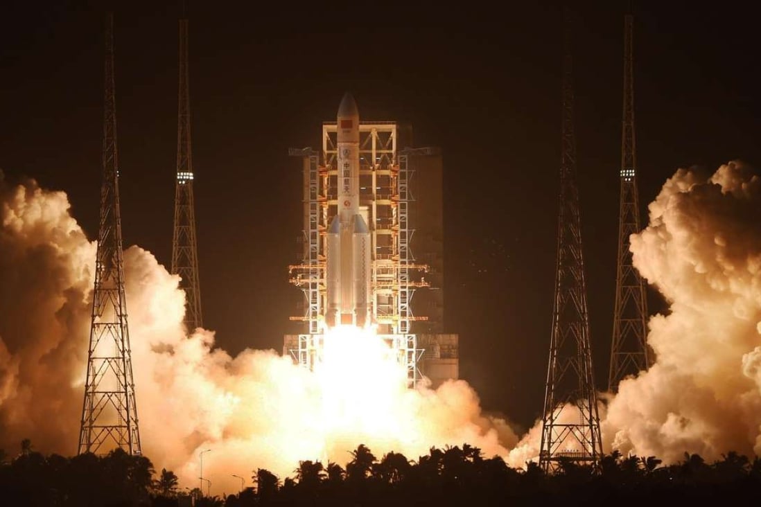 The Long March CZ-5 rocket takes off from the Wenchang base on Thursday night. Photo Xinhua.