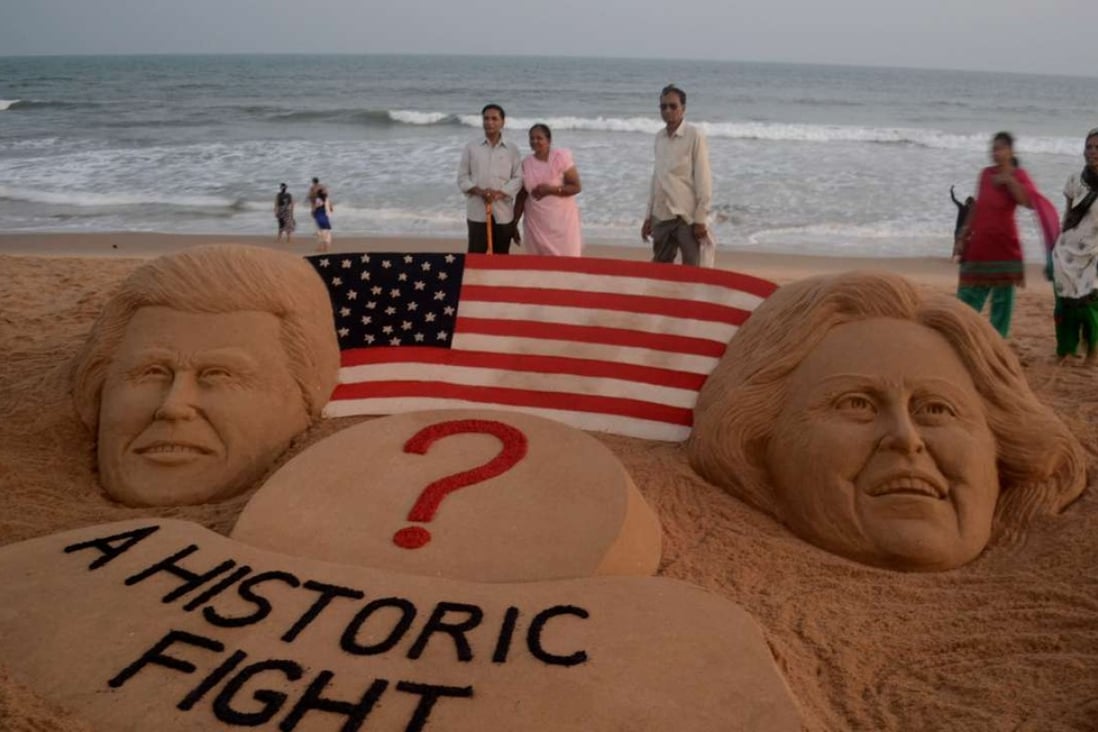 A sand sculpture by artist Sudarsan Pattnaik showing US presidential candidates Hillary Clinton and Donald Trump in Puri, 65km from the eastern Indian city Bhubaneswar. Photo: AFP