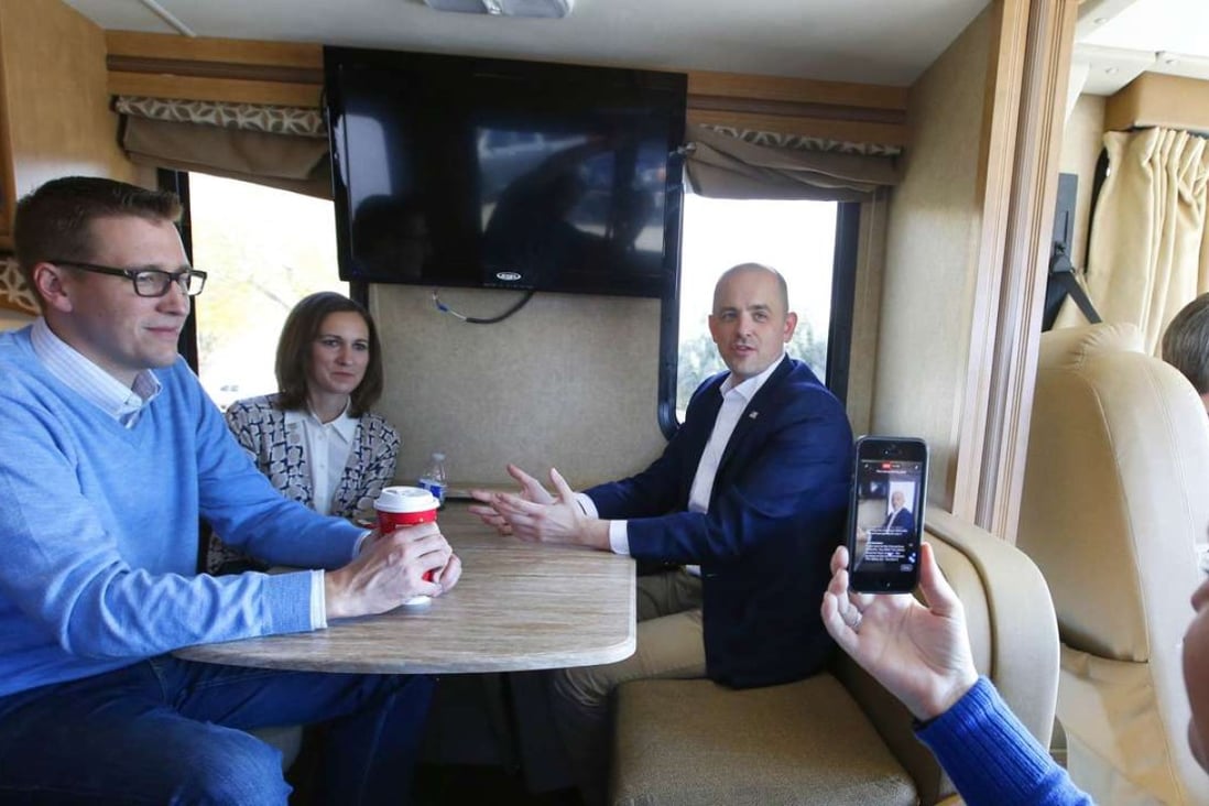 US independent presidential candidate Evan McMullin holds a "Facebook Live" event with his campaign staff as they ride in an RV between events in Ephriam, Utah. Photo: AFP