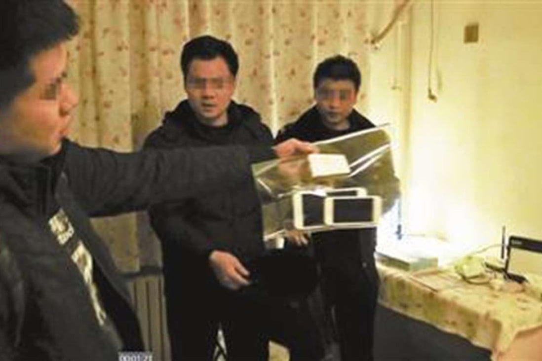 Police in Beijing seize equipment as part of their crackdown on the child-porn ring. Photo: SCMP Pictures