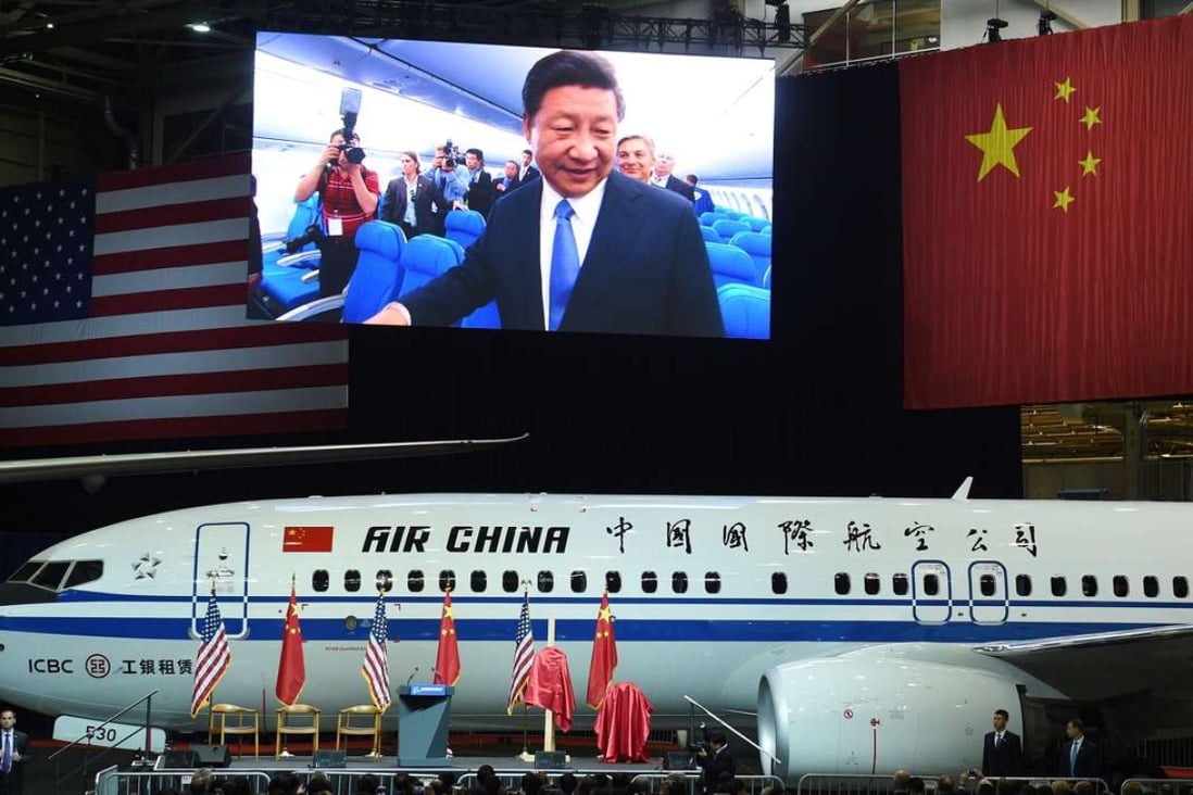 Chinese President Xi Jinping is seen on a screen touring a 737-800 aircraft at the Boeing assembly line in Everett, Washington, during a state visit to the US in September last year. The US understands China’s desire to reform global institutions that reflects its increasing footprint in the global economy and global security architecture. Photo: AFP