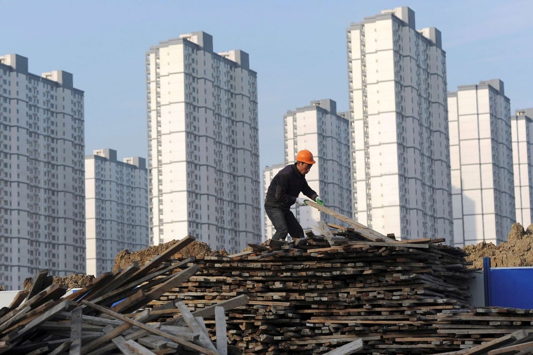 China’s average new home price growth rate slowed significantly in October after 22 cities rolled out a raft of cooling measures. Photo: Reuters