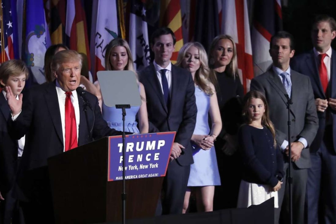 President-elect Donald Trump gives his acceptance speech, flanked by his family. Photo: AP