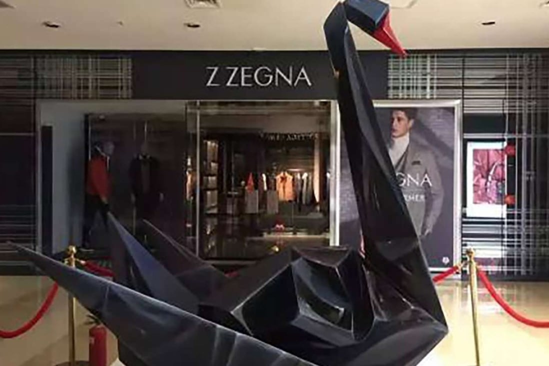 The black swan sculpture on display at the entrance to a Beijing shopping mall on Monday morning shortly before it was removed. Photo: SCMP Pictures