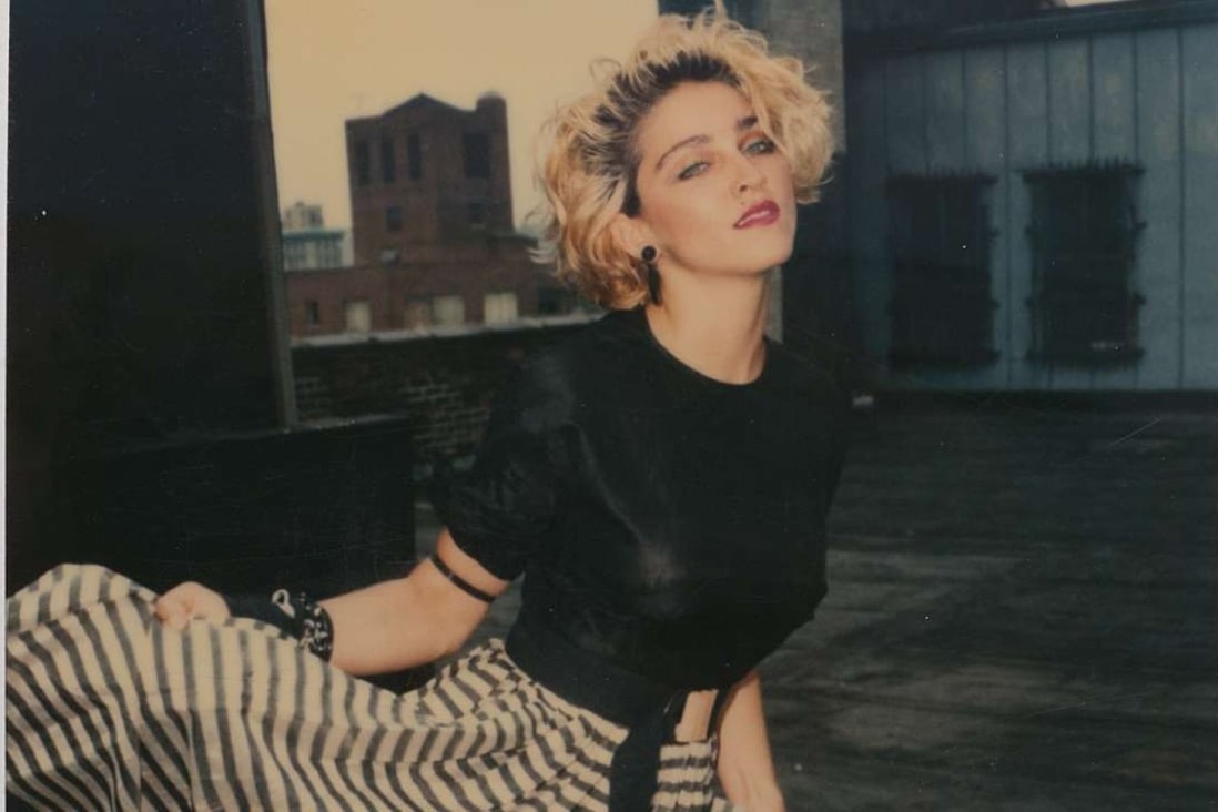 Madonna on the roof of her brother’s flat in this Polaroid image, one of 66 shot by photographer Richard Corman on June 17, 1983, and published in a new book, Madonna 66.
