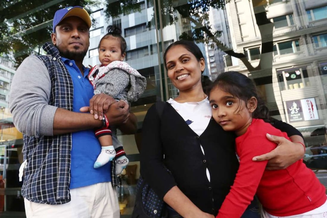 From left, Supun Thilina Kellapatha, his seven-month-old son Dinath, wife Nadeeka Dilrukshi Nonis and daughter Sethumdi, five. The family gave shelter to Edward Snowden during his time in the city in 2013. years old, poses for a picture in Wan Chai. Ajith who sheltered Snowden in Hong Kong. 02DEC16 SCMP / Photo: Jonathan Wong
