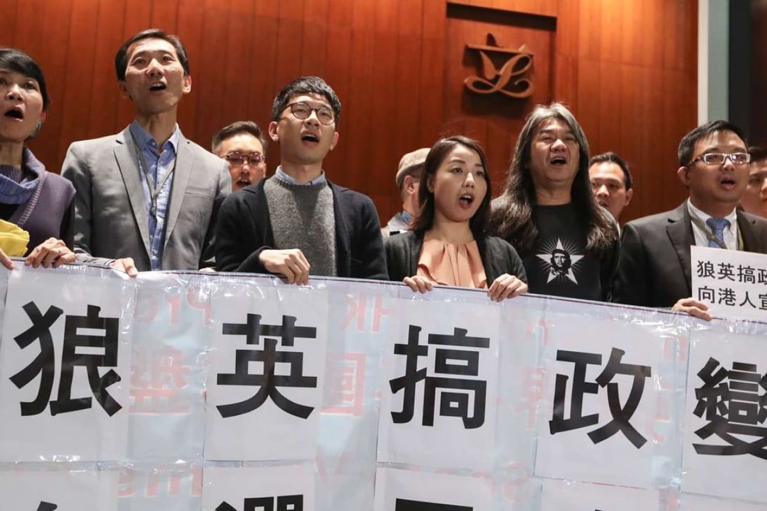 Lawmakers Claudia Mo Man-ching (left), Edward Yiu Chung-yim, Nathan Law Kwun-chung, Lau Siu-lai, Leung Kwok-hung and James To Kun-sun protest against Chief Executive Leung Chun-ying earlier this month. Photo: Nora Tam