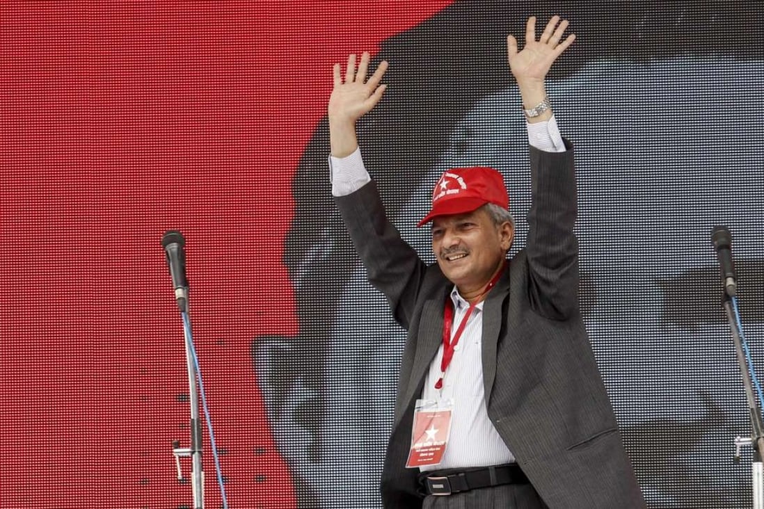Nepal’s former prime minster Baburam Bhattarai announces his new Naya Shaktai Nepal Party in front of supporters in Kathmandu in June. Photo: AFP