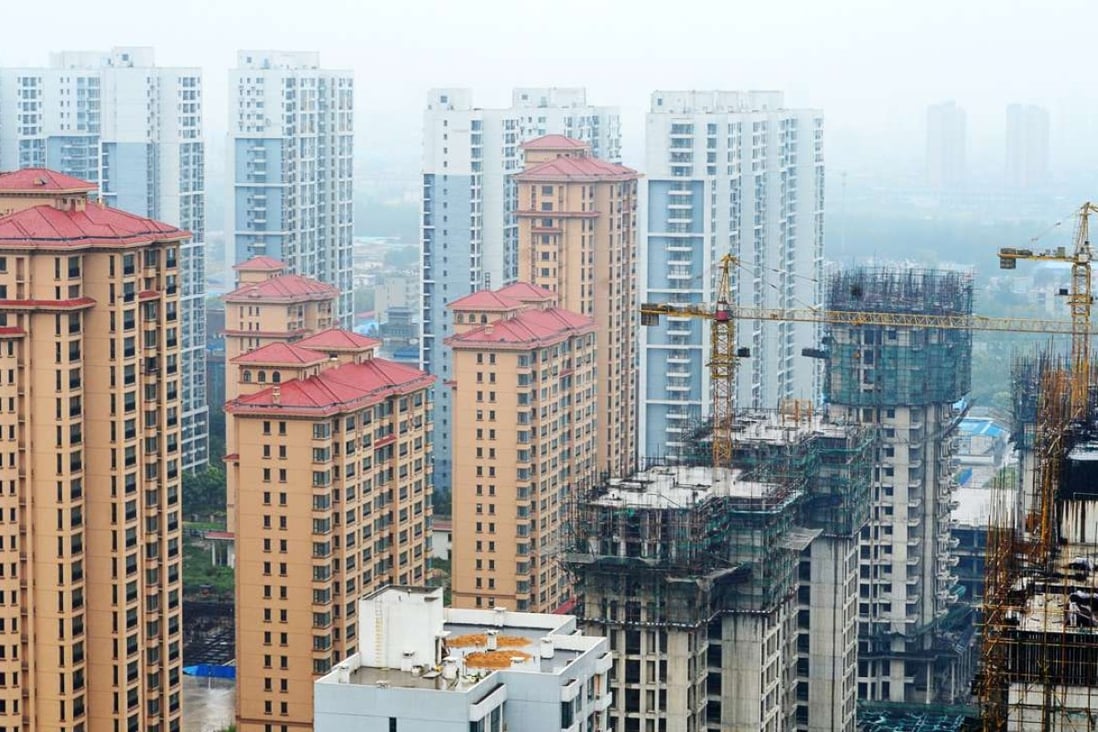 Average home prices in the 100 cities tracked by the China Index Academy stood at 12,938 yuan per square metre last month. Photo: Xinhua
