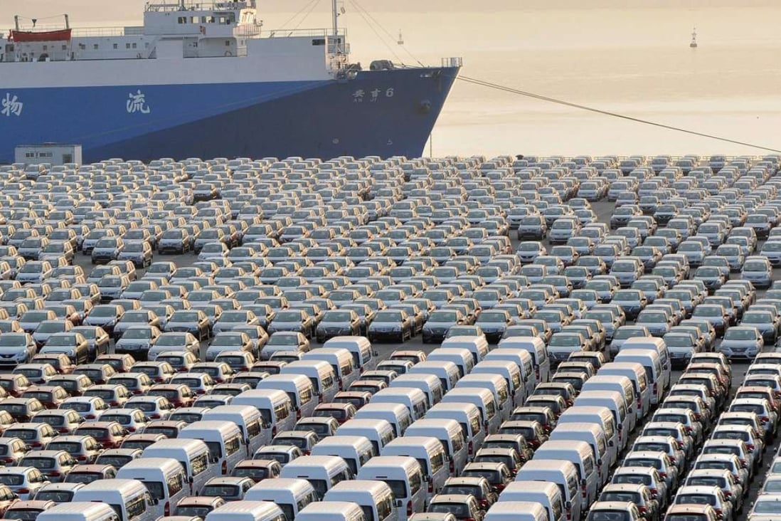 Chinese cars wait for export at a port in Dalian, Liaoning province in October. Reuters