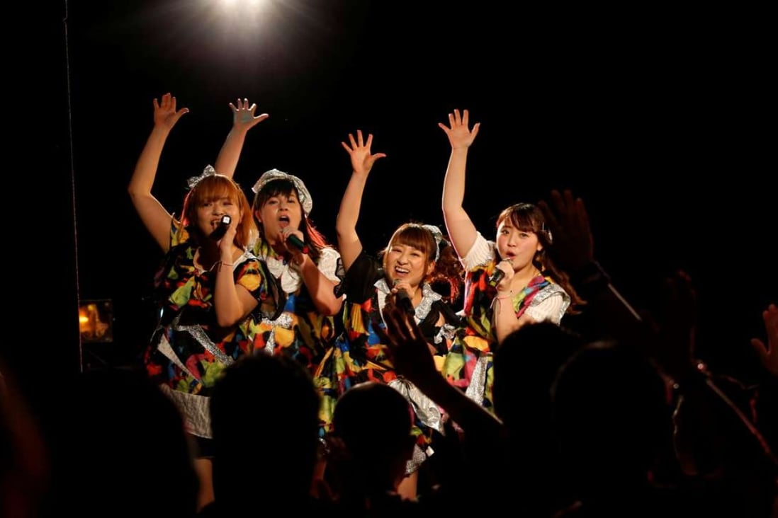 Members of pop group Pottya perform at a live theatre in Tokyo, Japan. Photo: Reuters