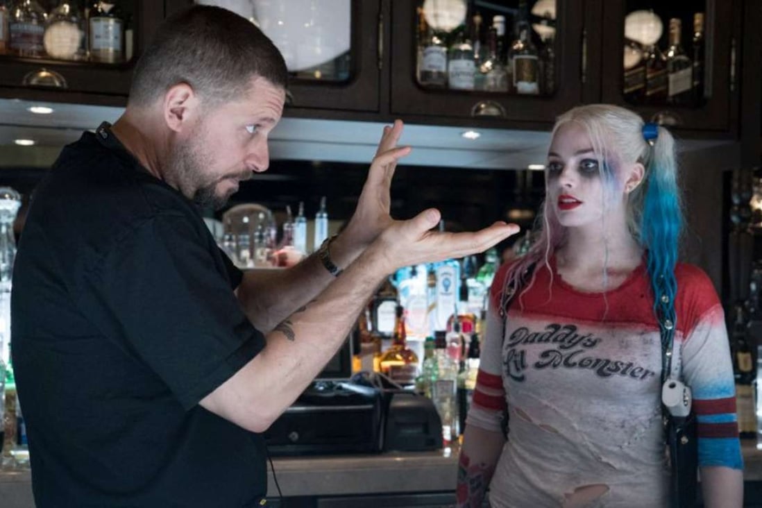 Suicide Squad director David Ayer guides Harley Quinn actress Margot Robbie. The two will reunite in Gotham City Sirens. Photo: Warner Bros. Pictures
