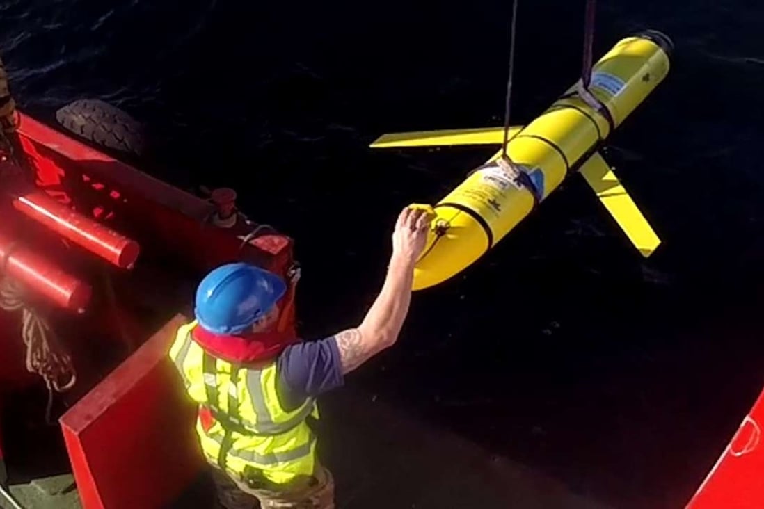 An ocean glider UUV being recovered off the coast of Scotland. On December 15, a similar unmanned underwater vehicle was snatched by the Chinese Navy as it was about to be collected off the coast of the Philippines. Photo: AFP