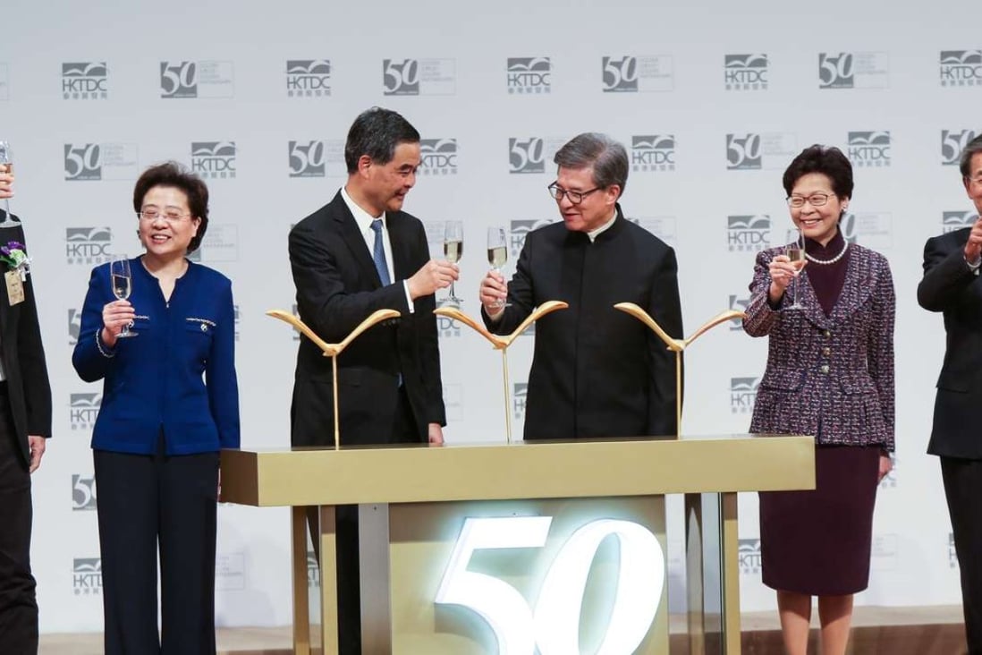 Chief Executive Leung Chun-ying (3rd from left) and Hong Kong Trade Development Council chairman Vincent Lo Hong-sui (3rd from right) in Wan Chai earlier this month celebrating the council’s 50th anniversary. Photo: Xiaomei Chen
