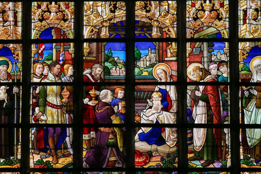 The stained glass window of St Gummarus Church in Lier, Belgium, depicting the Visit of the Three Wise Men.