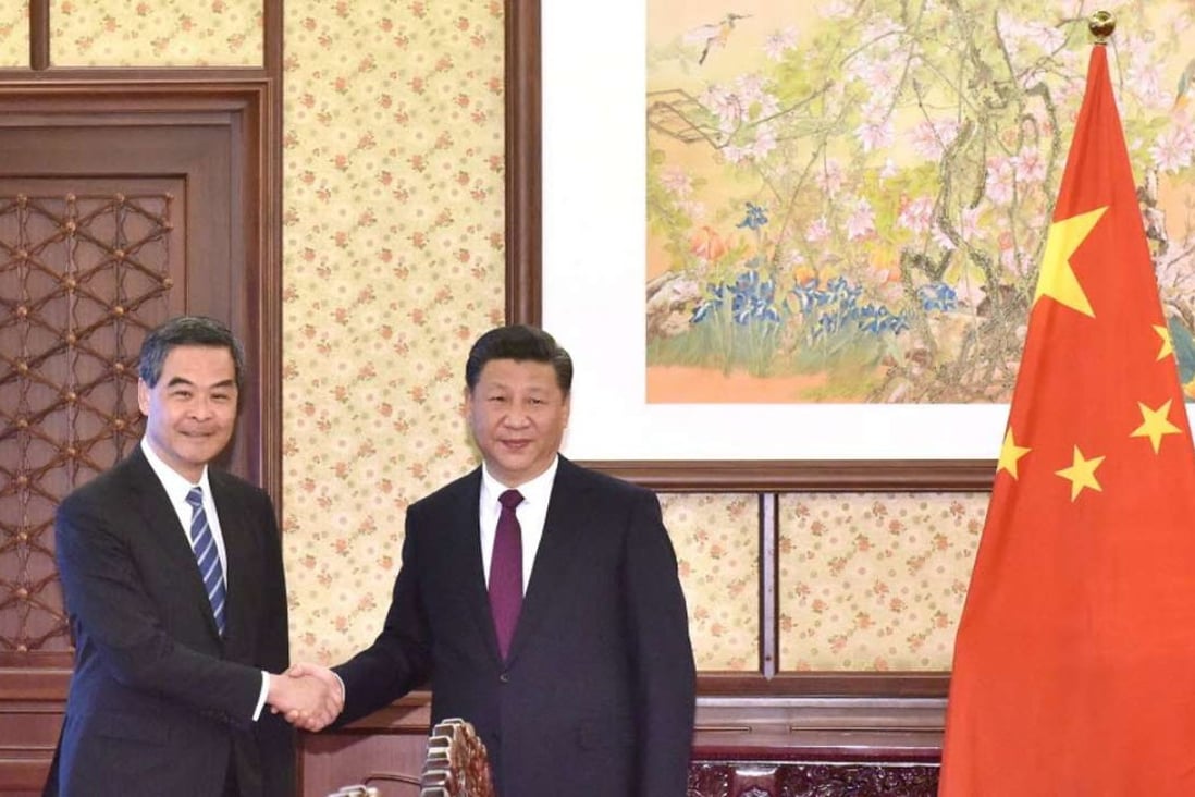 Hong Kong Chief Executive Leung Chun-ying with President Xi Jinping in Beijing on Friday. Photo: Information Services Department