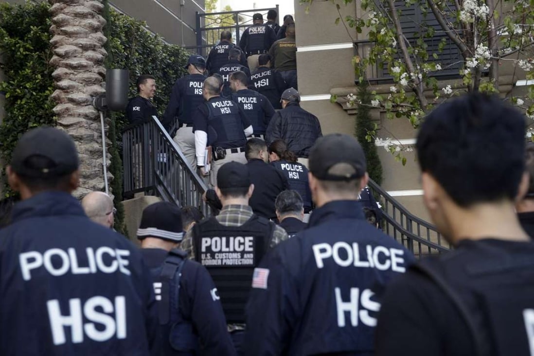 A file picture of US federal agents raiding a suspected “birth tourism” hotel in Irvine, California, in March 2015. Photo: AP
