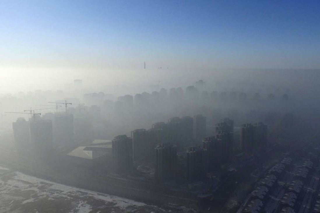 A picture taken on Monday of a thick band of smog enveloping Tianjin. Photo: Reuters