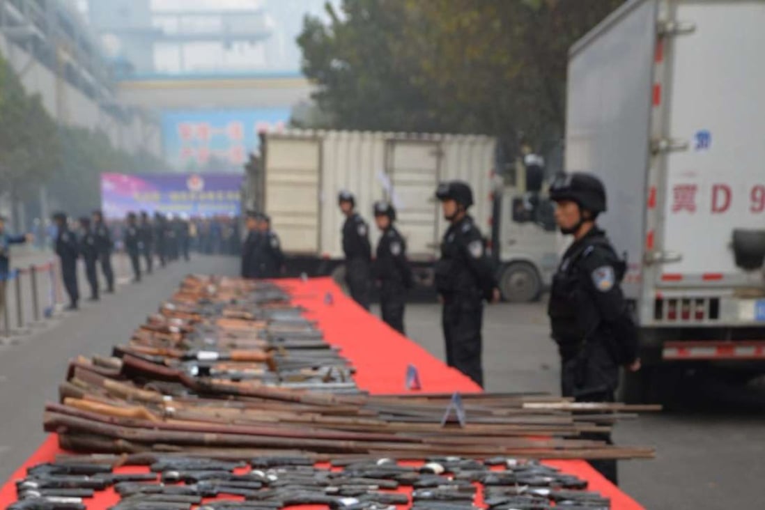 A collection of guns to be destroyed as part of a campaign against illegal weapons in Hebei province. Photo: EPA