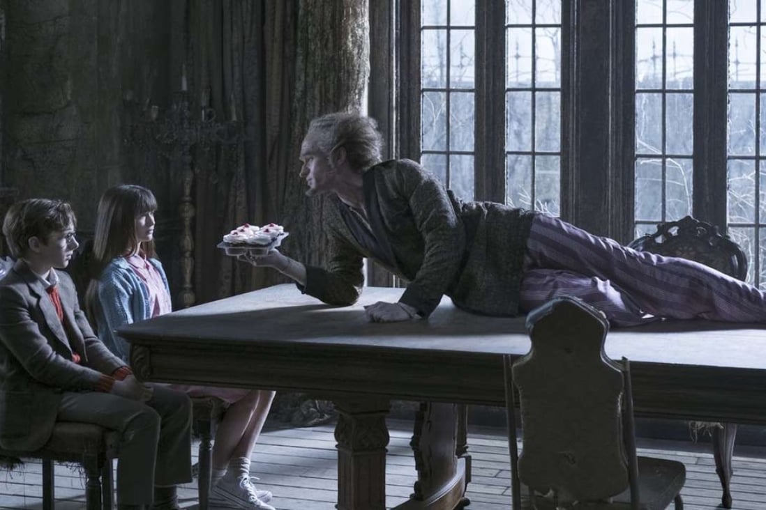 Louis Hynes, Malina Weissman and Neil Patrick Harris in the TV adaptation of A Series of Unfortunate Events.