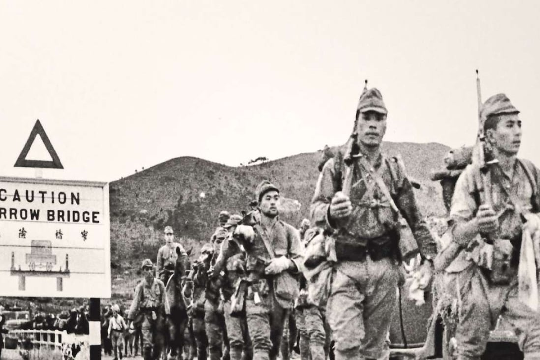 Japanese troops march across the border into Hong Kong. Photo: Alamy Stock Photo