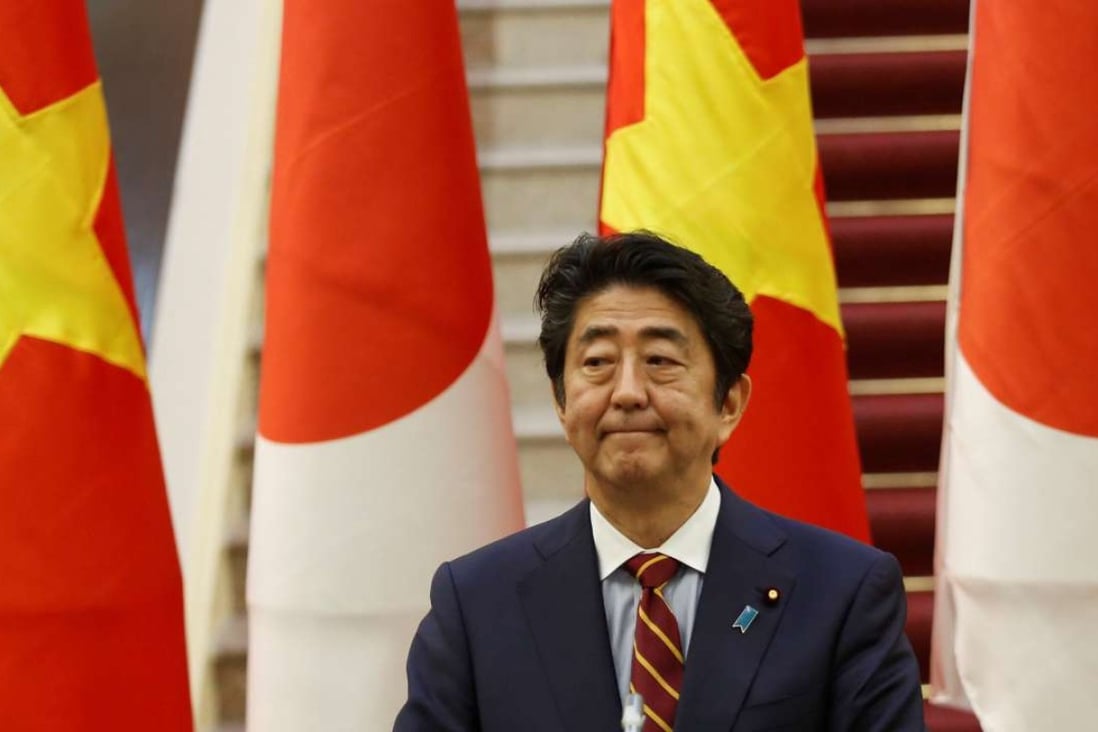 Japan's Prime Minister Shinzo Abe attends a press conference in Vietnam. Photo: Reuters