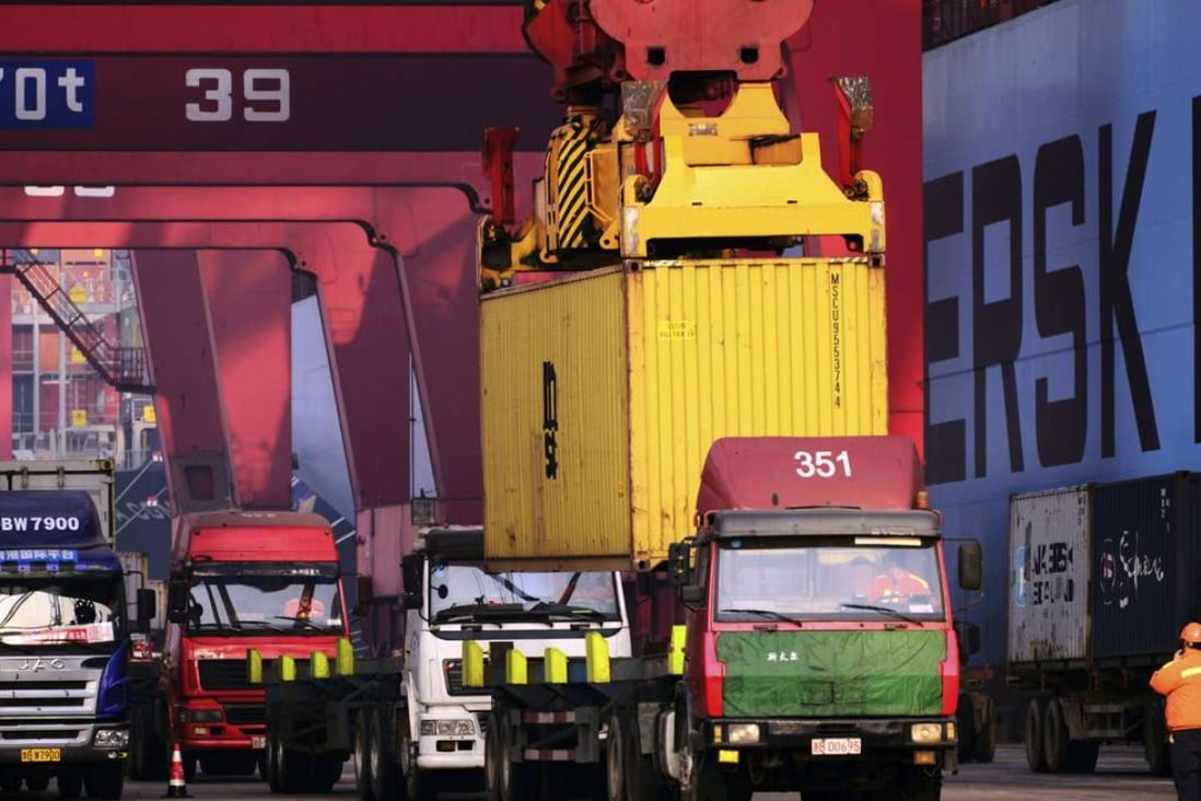 Trucks line up at a container port in Qingdao in Shandong province. Lester Ross from the American Chamber of Commerce in China says new anti-dumping investigations by China are in the pipeline. Photo: AP