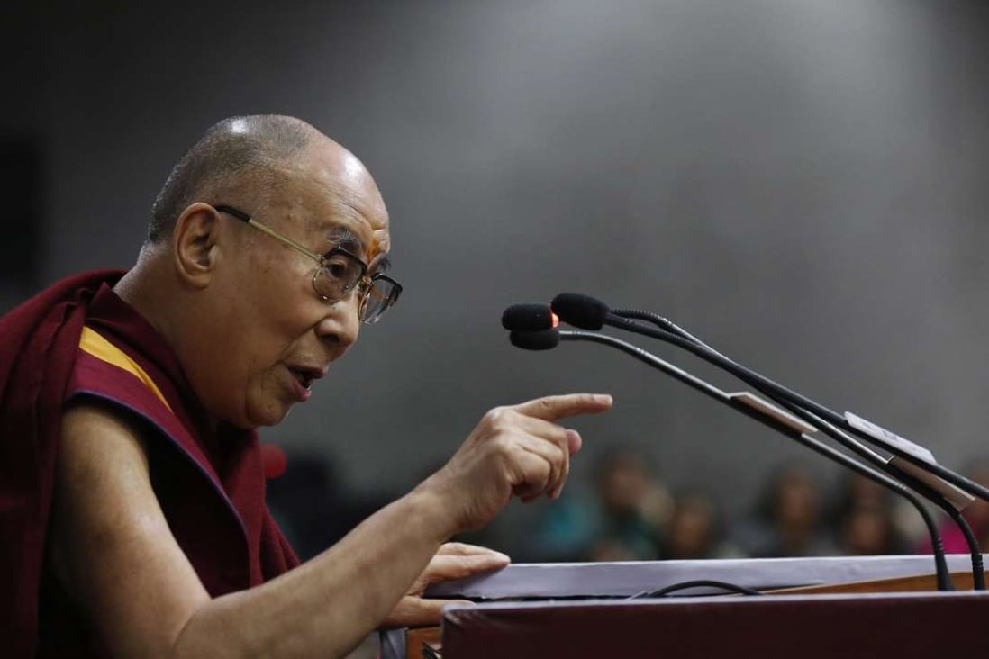 The Dalai Lama attends an event in New Delhi on Saturday. Photo: EPA