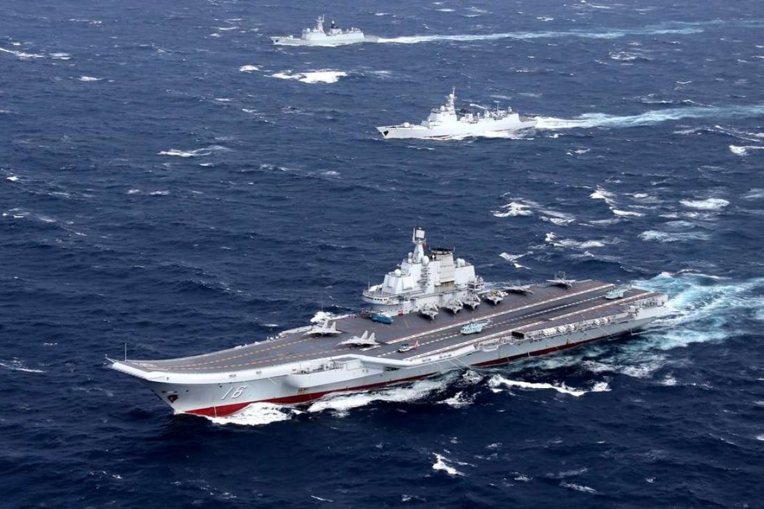 A file picture of China's sole aircraft carrier Liaoning taking part in a drill last month in the South China Sea. Photo: Reuters