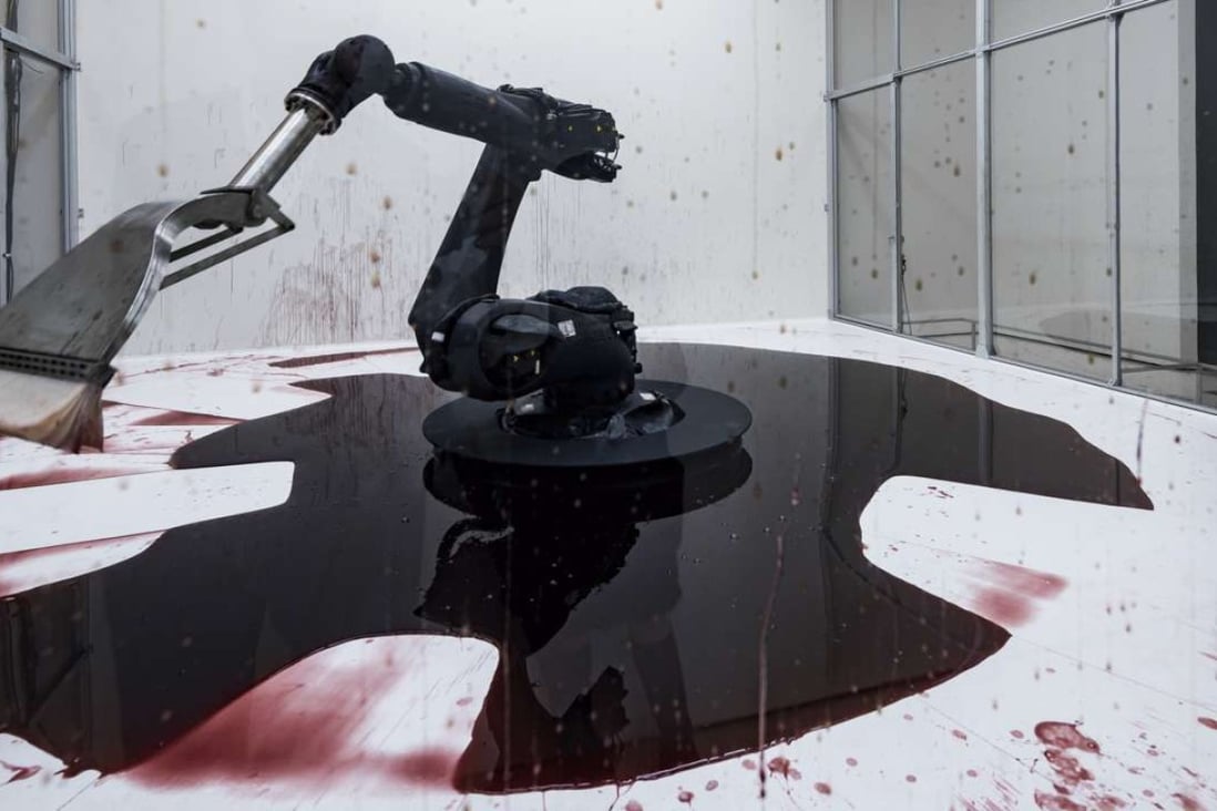 Artwork Can't Help Myself, by Sun Yuan and Peng Yu, features a modified industrial robot.