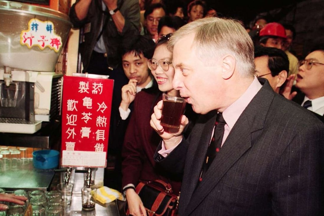 Then governor of Hong Kong, Chris Patten, sips a glass of herbal tea in Central, in 1993. Pictures: SCMP