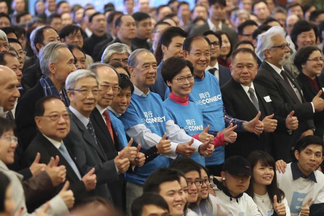 Chief executive candidate Carrie Lam and supporters at her rally at the Convention and Exhibition Centre on Friday. Photo: Edward Wong