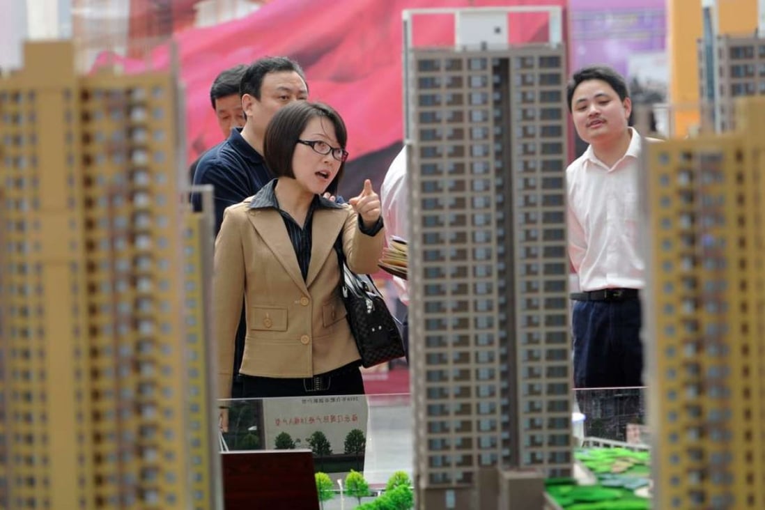 Visitors at a real estate exhibition on the first day of May Day holiday in Hefei. Prices of new homes surged by as much as 46.5 per cent last year in the Anhui provincial capital city, according to statistics bureau data. Photo: Xinhua