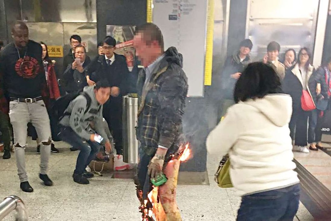 A man was seen on fire in the MTR station on Friday. Photo: Facebook