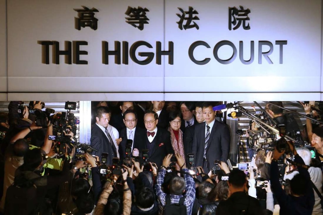 Donald Tsang Yam-kuen and wife Selina Tsang Pou Siu-mei (centre) left the High Court in Admiralty on Friday night after the verdicts. Photo: Felix Wong