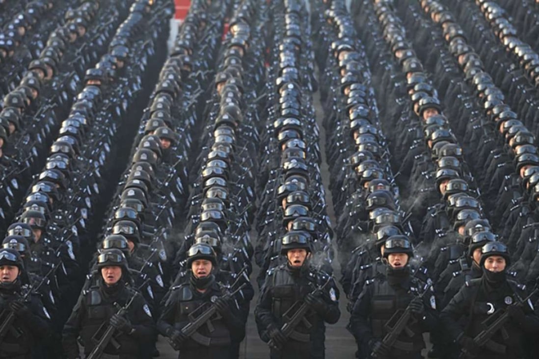 Chinese security forces take part in an anti-terror rally in Xinjiang. Photo: Handout