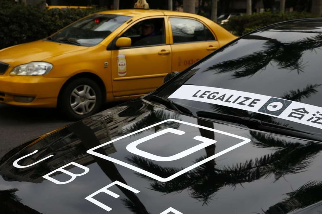 An Uber driver joins a protest calling for the legalisation of Uber in Taipei earlier this month. Photo: EPA