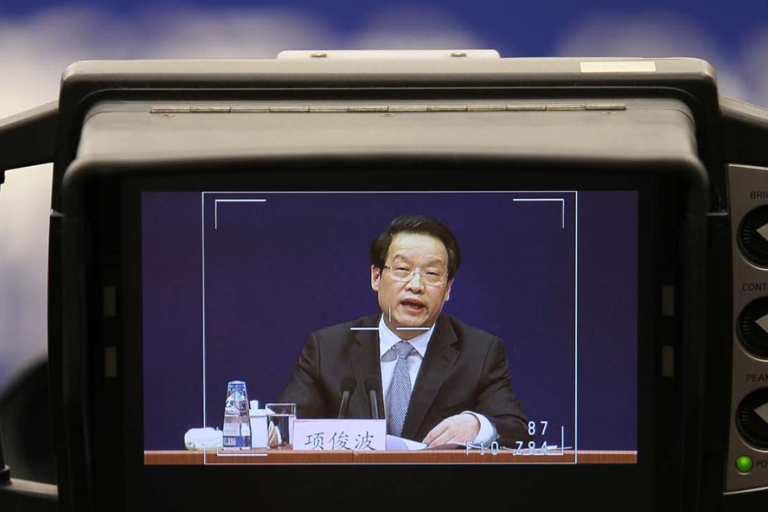 Xiang Junbo, Chairman of the China Insurance Regulatory Commission, speaking at his first public appearance since January 12, where he chimed in on a war of words against illicit fund raising by insurance companies, vowing to crack down on companies that breach the regulator’s rules.Photo: Simon Song